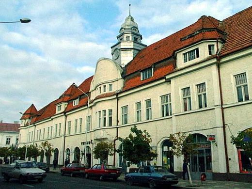 The town hall with its clock tower, in a recent photograph